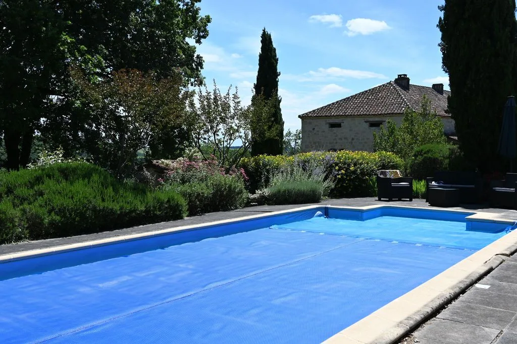 The pool, sheltered by lavender and cypress
